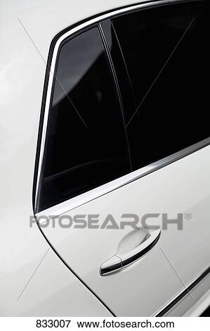 A close-up detail of a white luxury car View Large Photo Image Stock Photo - A close-up detail of a white luxury car. Fotosearch