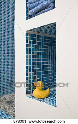 A rubber duck on a tiled bathroom shelf View Large Photo Image Stock Image - A rubber duck on a tiled bathroom shelf. Fotosearch
