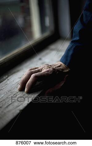 A senior man's hand holding onto a window sill View Large Photo Image Stock Photo - A senior man's hand holding onto a window sill. Fotosearch