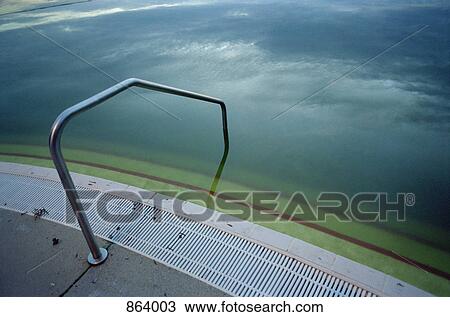 Edge of a murky swimming pool View Large Photo Image Stock Image - Edge of a murky swimming pool. Fotosearch
