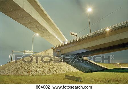 Low angle view of highway overpass View Large Photo Image Stock Image - Low angle view of highway overpass. Fotosearch