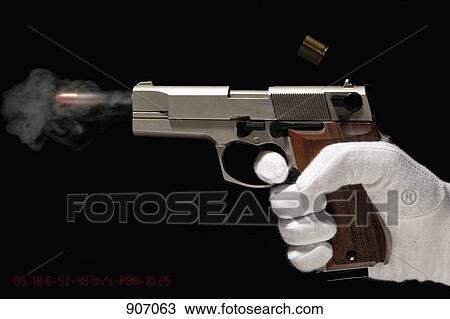 A 手袋をした手 発砲 A 銃 ストックイメージ Fotosearch