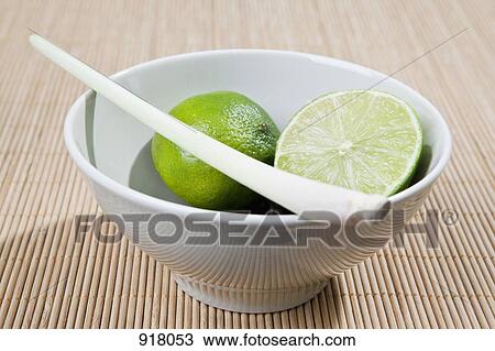 A bowl of halved limes and lemongrass View Large Photo Image Stock Image - A bowl of halved limes and lemongrass. Fotosearch