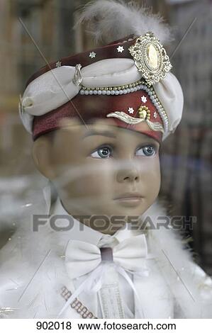 Stock Photo - A boy mannequin wearing a turban. Fotosearch
