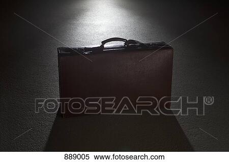 A briefcase spot lit at night View Large Photo Image Stock Photography - A briefcase spot lit at night. Fotosearch