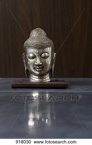 A Buddha head statue View Large Photo Image Stock Image - A Buddha head statue. Fotosearch