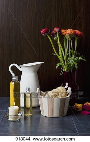 A bunch of flowers and spa treatments, still life View Large Photo Image Picture - A bunch of flowers and spa treatments, still life. Fotosearch