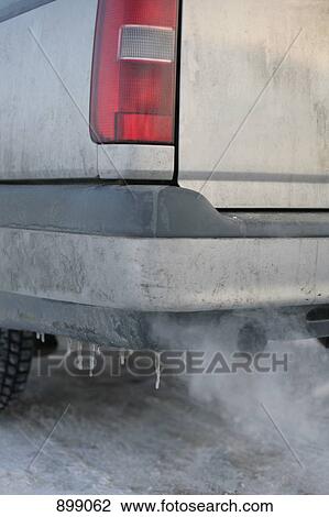 A car exhaust pipe emitting fumes View Large Photo Image Stock Image - A car exhaust pipe emitting fumes. Fotosearch