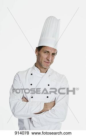 A chef with arms crossed and cocked head, portrait View Large Photo Image Stock Photo - A chef with arms crossed and cocked head, portrait. Fotosearch