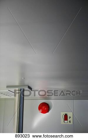 Stock Image - A fire alarm on the wall of a nautical vessel. Fotosearch