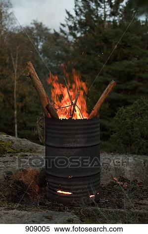 A fire burning in an oil drum View Large Photo Image Stock Photography - A fire burning in an oil drum. Fotosearch