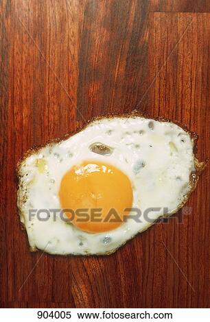 A fried egg View Large Photo Image Stock Photography - A fried egg. Fotosearch