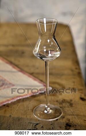 A glass of Schnapps, a fruit brandy View Large Photo Image Stock Photo - A glass of Schnapps, a fruit brandy . Fotosearch