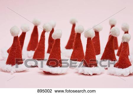 A large group of Santa hats View Large Photo Image Stock Image - A large group of Santa hats. Fotosearch