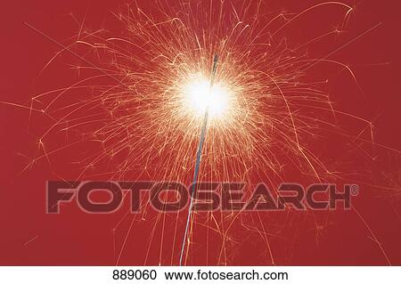Stock Image - A lit sparkler. Fotosearch