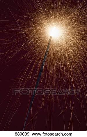 Stock Photo - A lit sparkler. Fotosearch