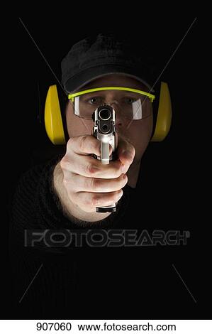 A Man Aiming A Gun View Large Photo Image Stock Image - A Man Aiming A Gun. Fotosearch
