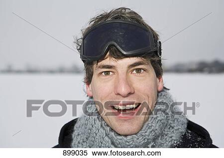 A man outdoors in winter, head and shoulders, portrait View Large Photo Image Stock Photography - A man outdoors in winter, head and shoulders, portrait. Fotosearch