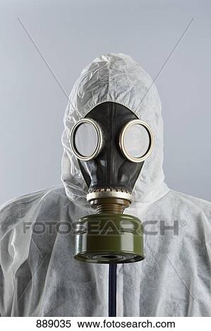 A man wearing a gas mask and protective suit View Large Photo Image Stock Photography - A man wearing a gas mask and protective suit. Fotosearch