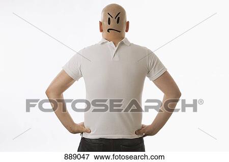 A man with a face drawn on the back of his head and wearing his clothes in reverse View Large Photo Image Stock Photo - A man with a face drawn on the back of his head and wearing his clothes in reverse. Fotosearch