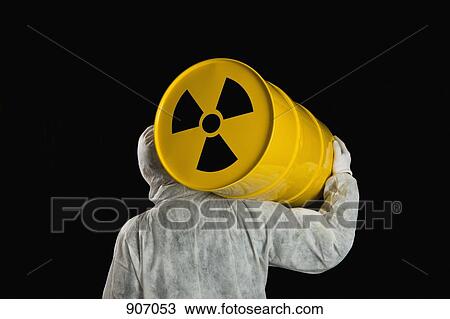 A Person Carrying A Radioactive Barrel View Large Photo Image Stock Image - A Person Carrying A Radioactive Barrel. Fotosearch