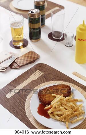 Stock Photograph - A plate of schnitzel. Fotosearch