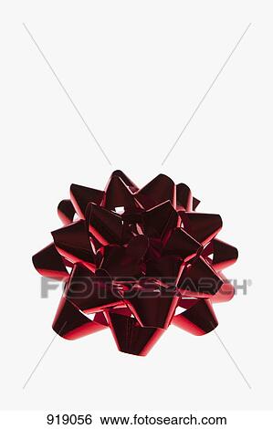 Stock Photograph - A red ribbon rosette. Fotosearch