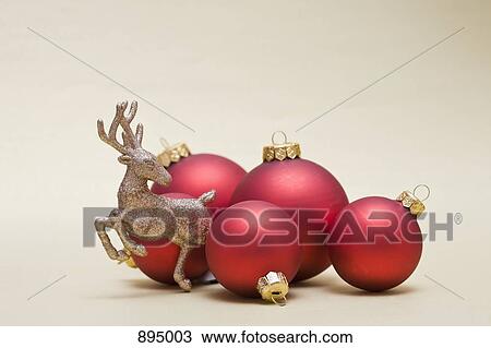 A sparkly jumping reindeer figurine and five ornaments View Large Photo Image Stock Image - A sparkly jumping reindeer figurine and five ornaments. Fotosearch
