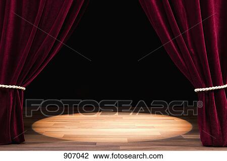 Stock Image - A Spot Lit Empty Theatre Stage. Fotosearch