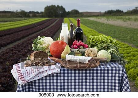 A table of fresh food and drinks set on a farm View Large Photo Image Stock Image - A table of fresh food and drinks set on a farm. Fotosearch