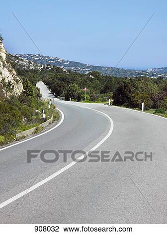 A two lane highway in a rural setting View Large Photo Image Stock Image - A two lane highway in a rural setting. Fotosearch