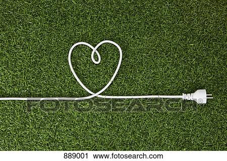An electrical cord arranged in a heart shape on grass View Large Photo Image Stock Image - An electrical cord arranged in a heart shape on grass. Fotosearch