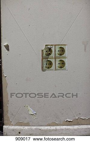 Stock Photo - An image of power sockets on a wall. Fotosearch