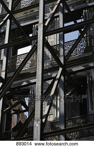 Balconies with wrought iron railings and fire escape View Large Photo Image Picture - Balconies with wrought iron railings and fire escape. Fotosearch