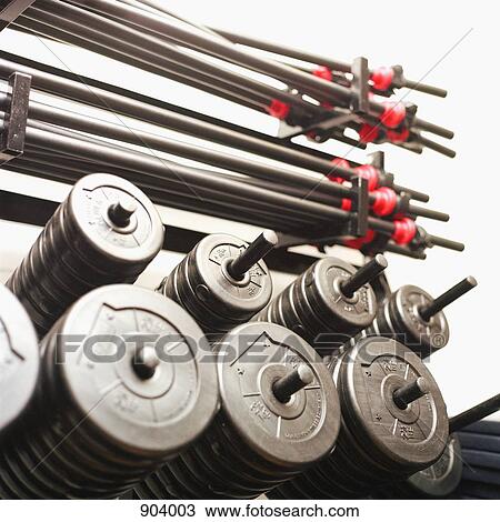 Stock Image - Barbells and weights. Fotosearch