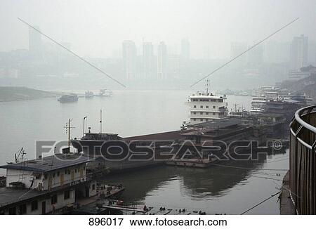 Boats in a harbor, Yellow River, Chongqing, China View Large Photo Image Stock Photo - Boats in a harbor, Yellow River, Chongqing, China. Fotosearch