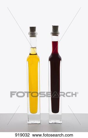 Bottles of olive oil and balsamic vinegar View Large Photo Image Stock Image - Bottles of olive oil and balsamic vinegar. Fotosearch