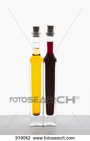 Bottles of olive oil and balsamic vinegar View Large Photo Image Stock Image - Bottles of olive oil and balsamic vinegar. Fotosearch