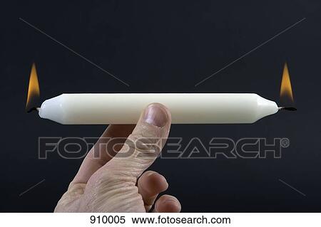 Stock Photography - Burning the candle at both ends. Fotosearch
