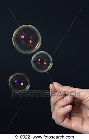 Stock Image - Burst your bubble. Fotosearch