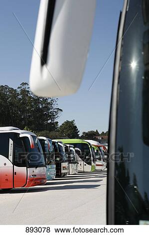Stock Photo - Coach buses parked in a row. Fotosearch