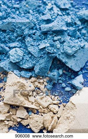 Stock Photo - Crushed blue and beige eye shadow. Fotosearch