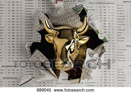 Detail of a golden bull breaking through the finance section of a newspaper View Large Photo Image Stock Photography - Detail of a golden bull breaking through the finance section of a newspaper. Fotosearch