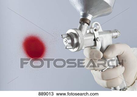 Detail of a hand painting with a paint gun View Large Photo Image Stock Image - Detail of a hand painting with a paint gun. Fotosearch
