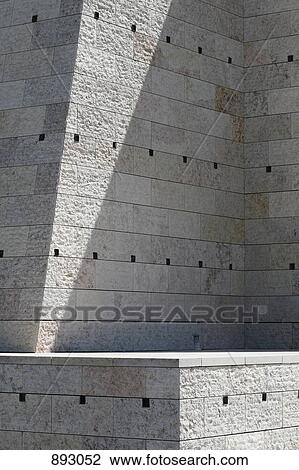 Stock Image - Detail of a ledge and a stone wall. Fotosearch
