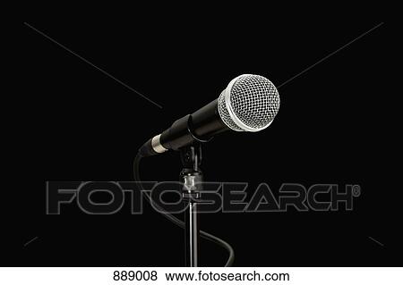 Detail of a microphone on a stand View Large Photo Image Stock Photo - Detail of a microphone on a stand. Fotosearch