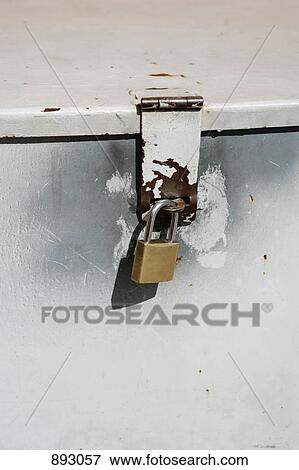 Detail of a padlock on a metal container View Large Photo Image Stock Photo - Detail of a padlock on a metal container. Fotosearch