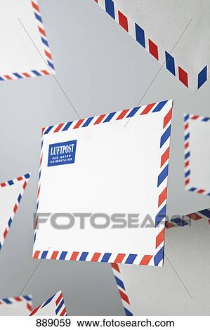 Stock Photo - Floating air mail envelopes. Fotosearch