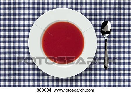 Picture - High angle view of a bowl of tomato soup. Fotosearch