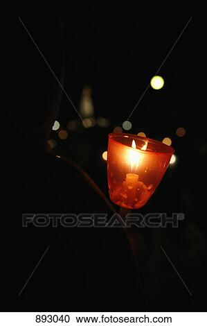 Lit votive candle View Large Photo Image Stock Image - Lit votive candle. Fotosearch